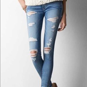 Light wash high waisted ripped jeans. Size 4 SHORT